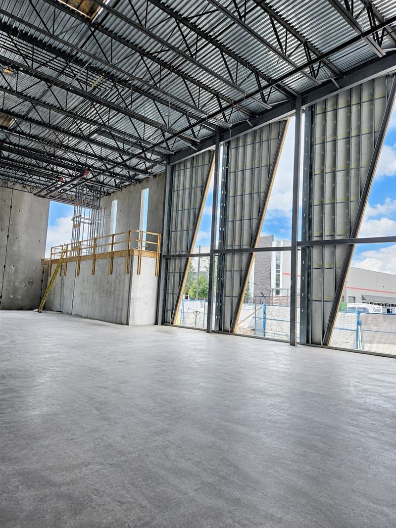 Steel stud wall framing inside a commercial building under construction